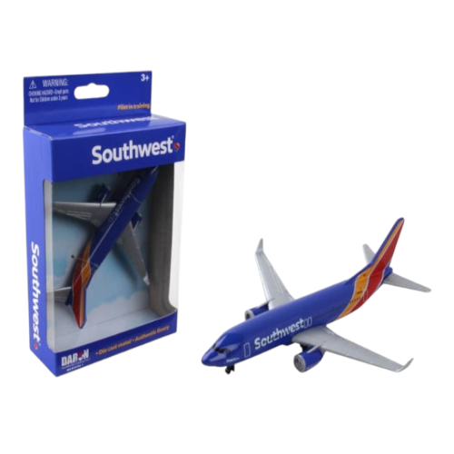 A Southwest Airlines Die-Cast Airplane by Daron Toys, with the aircraft displayed both inside and outside of its packaging.