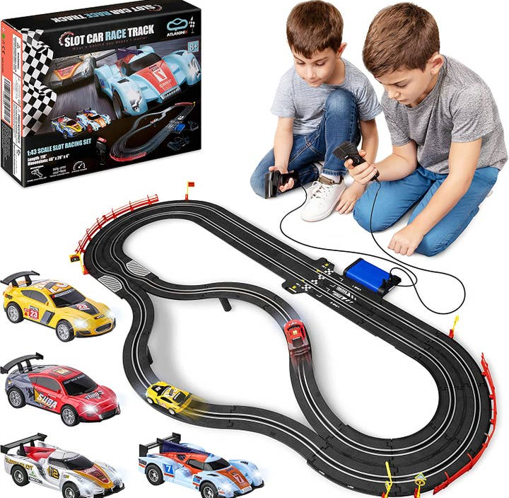 Slot Car Race Tack with 4 Cars  Use Battery or Electric Race Car